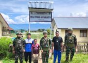 Satgas Yonif 521/DY Karya Bhakti Mendirikan Gapura MTSN Walesi