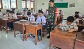 Peran Aktif Babinsa Dalam Membantu Pendistibusian MBG di Sekolah