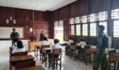 Kepedulian Satgas Yonif 410/Alugoro Terhadap Perkembangan Pendidikan di Sekitar Pos