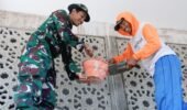 Satgas TMMD Marinir Rehabilitasi Musholla Al Ikhlas di Desa Gadungan