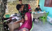 Satgas Pamtas RI–Malaysia Yonarmed 19/Bogani Gelar Pengobatan Gratis bagi Masyarakat Desa Tombolango
