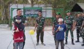 Prajuti Yonif TP 449/SH Larut Dalam Kecerian Lomba 17-an Bersama Warga