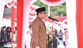 Satgas Pamtas RI-Malaysia Yonarmed 19/Bogani Ikuti Upacara Bendera HUT ke-81 Kemerdekaan RI di PLBN Entikong